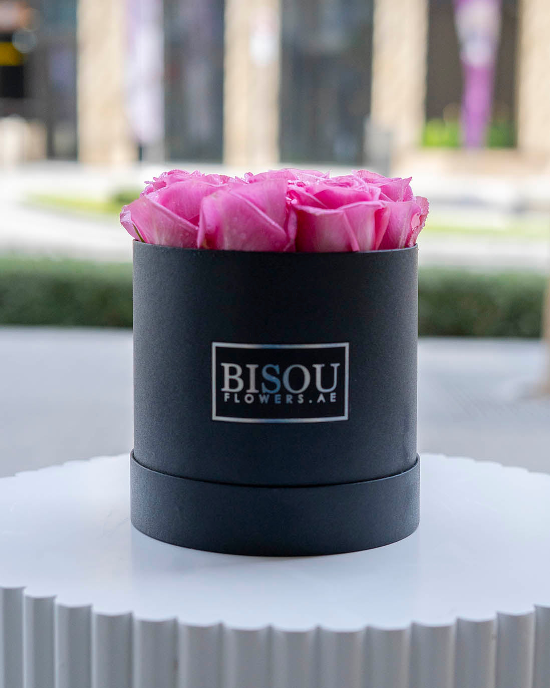 pink roses in BISOU drum shaped box