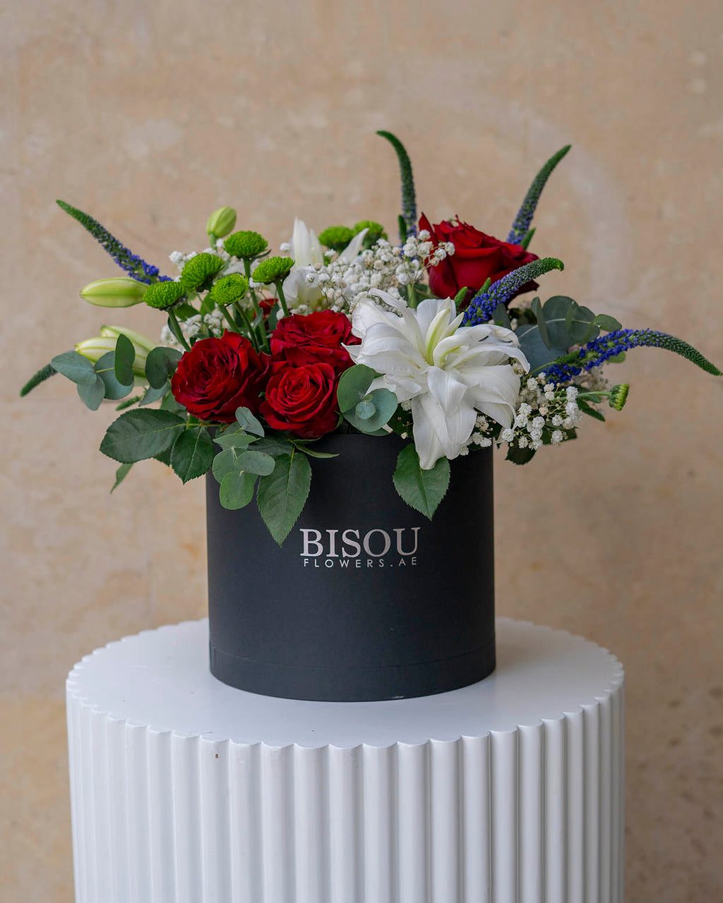 bella flower bouquet arrangement in a drum box