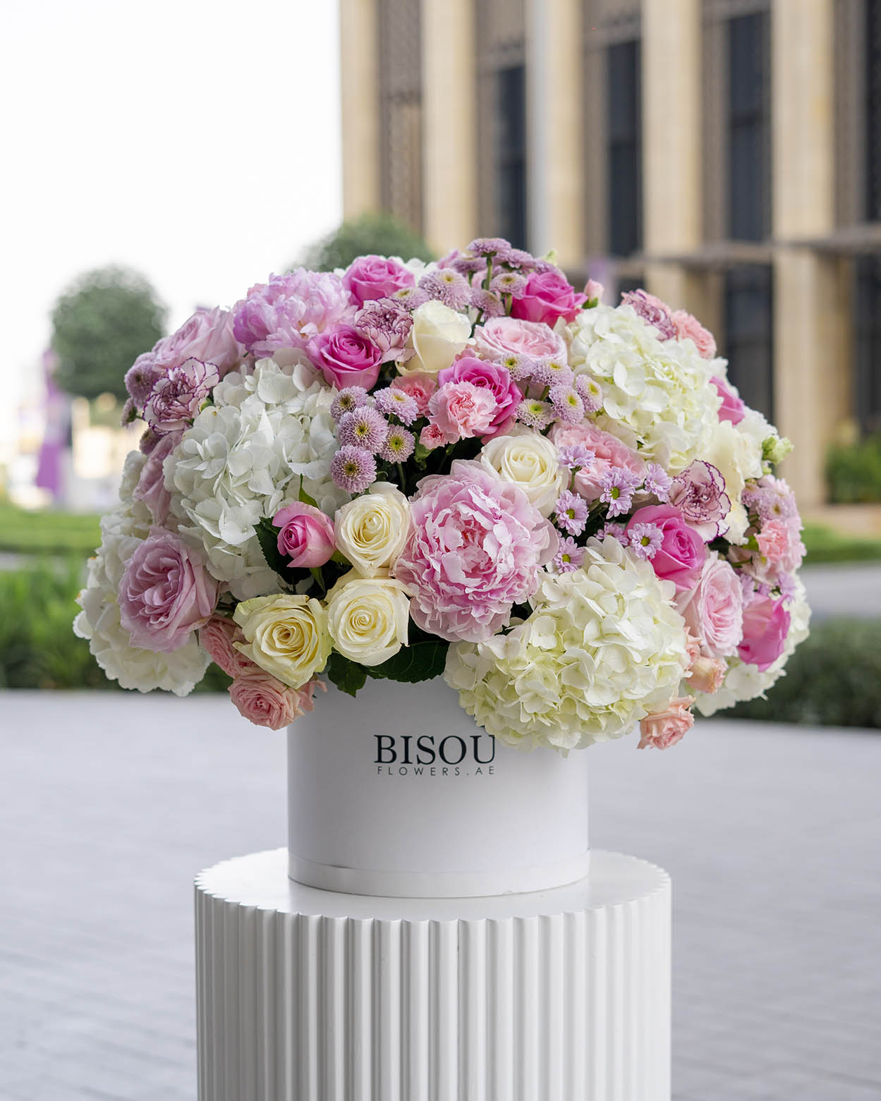 Sajee bouquet containing various flowers