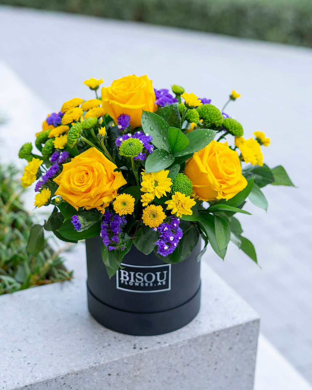 sunny flower bouquet arranged in a drum box