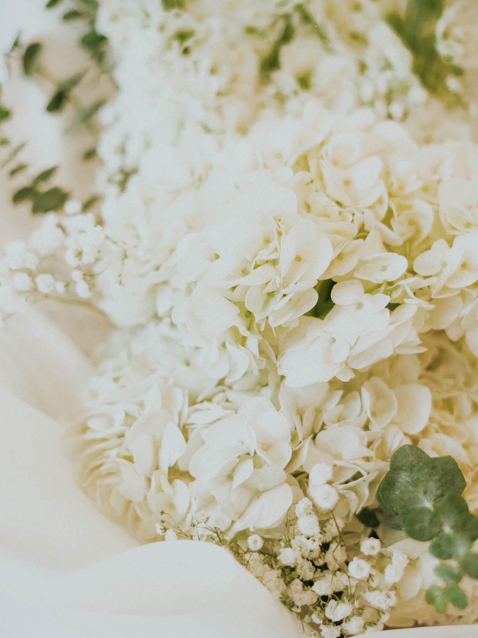 delphinium, hydrangea and eucalyptus hand-tied flower arrangement