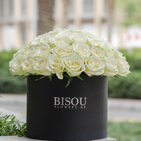 large drum box of white roses arrangement
