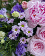 variety of flowers beautifully arranged in a large box