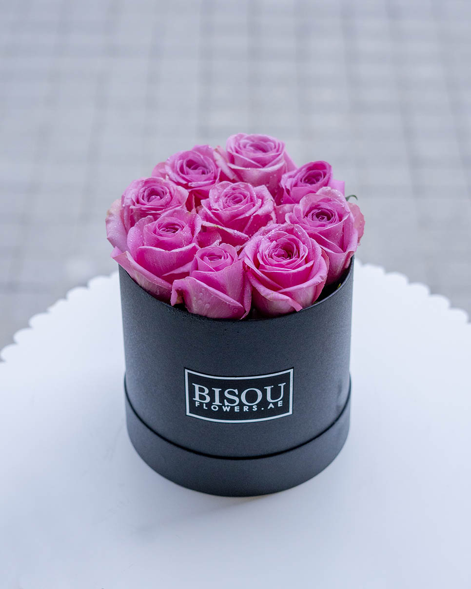 amore 9 pink roses packed in BISOU drum shaped box