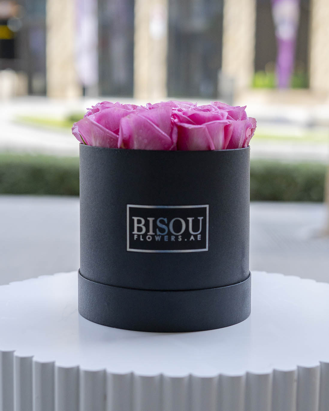 pink roses in BISOU drum shaped box