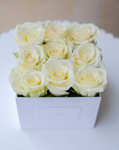 box of 9 white roses
