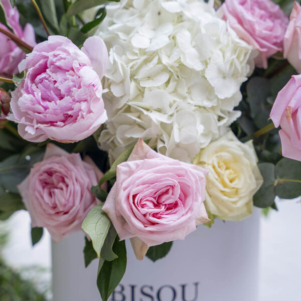 Platinum bouquet containing various pink flowers