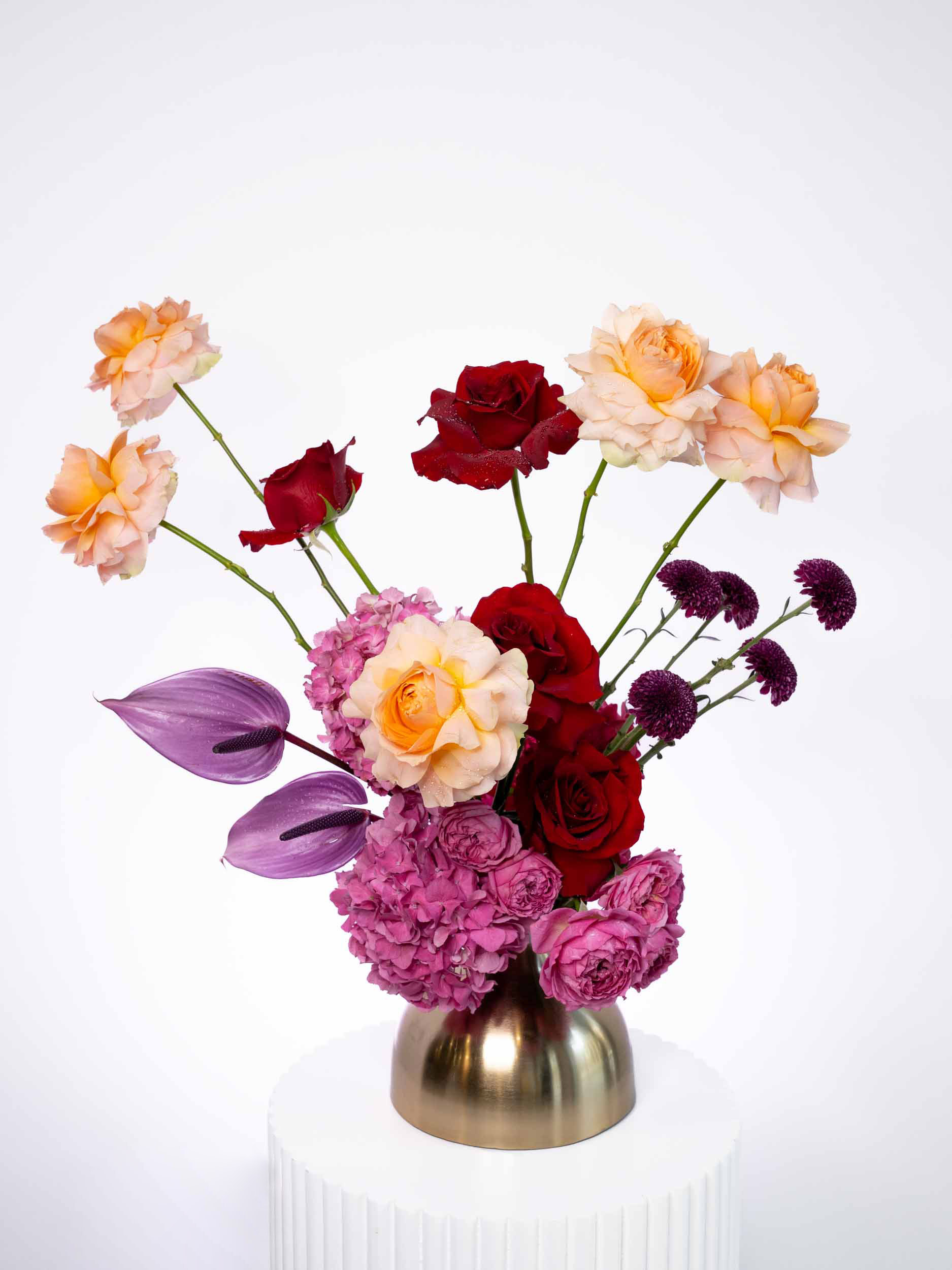 Ethereal beauty flowers arranged in a brass vase
