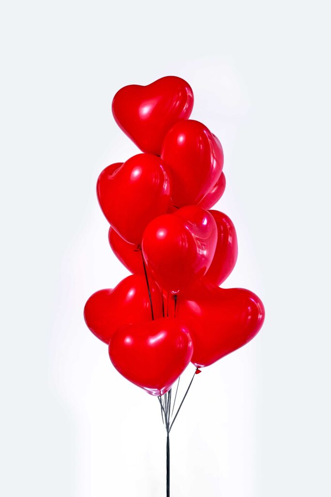 10 red heart helium balloons