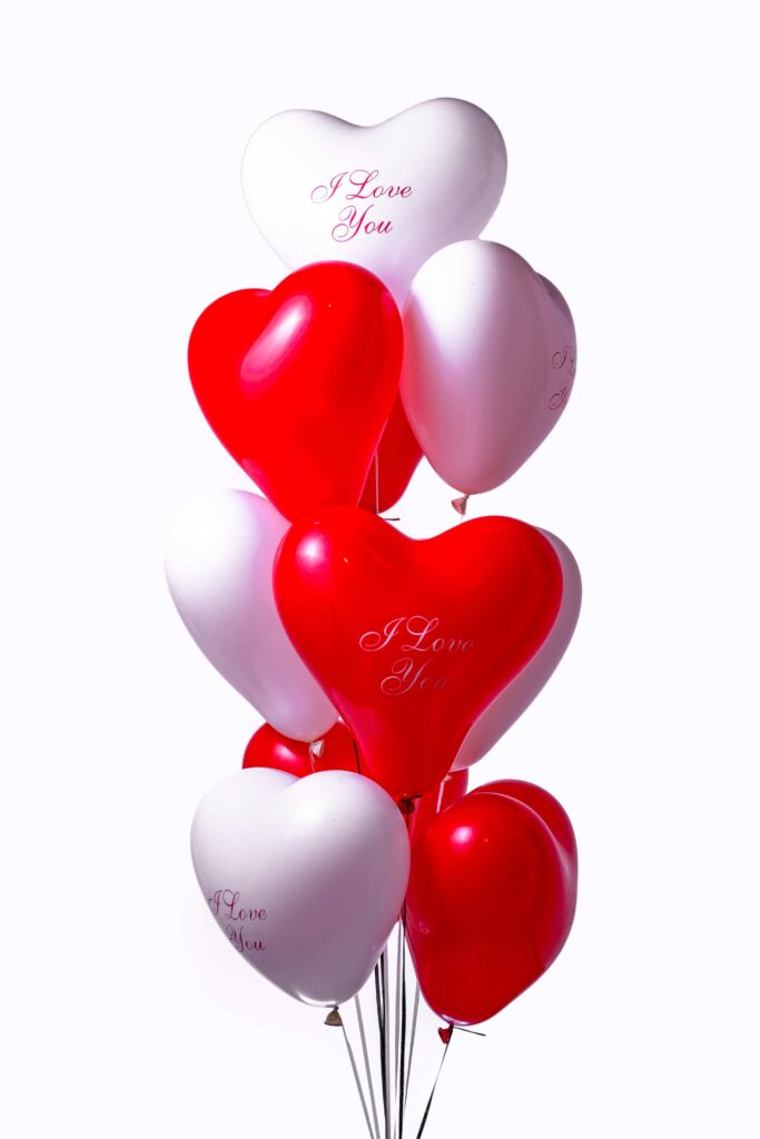 10 red and white heart balloons